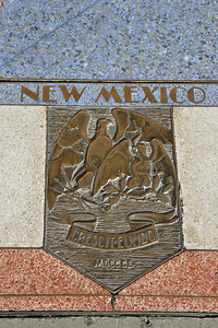 Bas relief plaque for New Mexico is inlaid into Hoover Dams plazas surface one of the seven states that fall within the Colorado Rivers basin. Hoover Dam Arizona Nevada USA