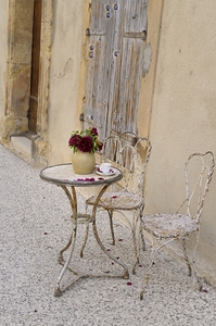 Outdoor table with flowers by Kevin Oke