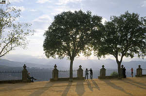 People enjoying the view from the Alameda del Tajo Ronda Málaga Andalusia Spain by Kevin Oke