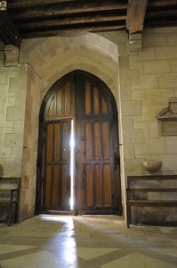 Shaft of light coming through the entrance door.  Eglise de Saint Maurice. Chatillon-sur-Loire Centre. France by Kevin Oke