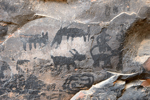 Black petroglyphs of animals Palatki Ruins Arizona USA by Kevin Oke
