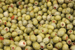 Green olives with pimentos been sold in bulk Lourmarin