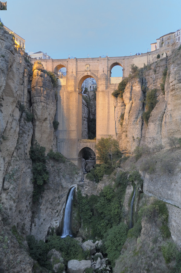 Guadalevín River and waterfall at dusk Puente Nuevo El Tajo Gorge Ronda Málaga Andalusia Spain  Print