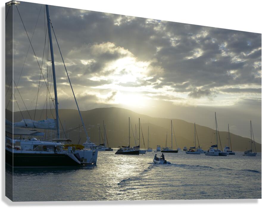 Dinghy heading out to the anchorage Canvas Print