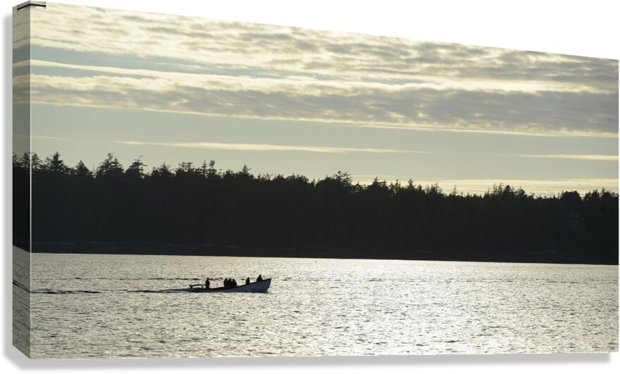 Backlit small boat coming into Tofino Canvas Print