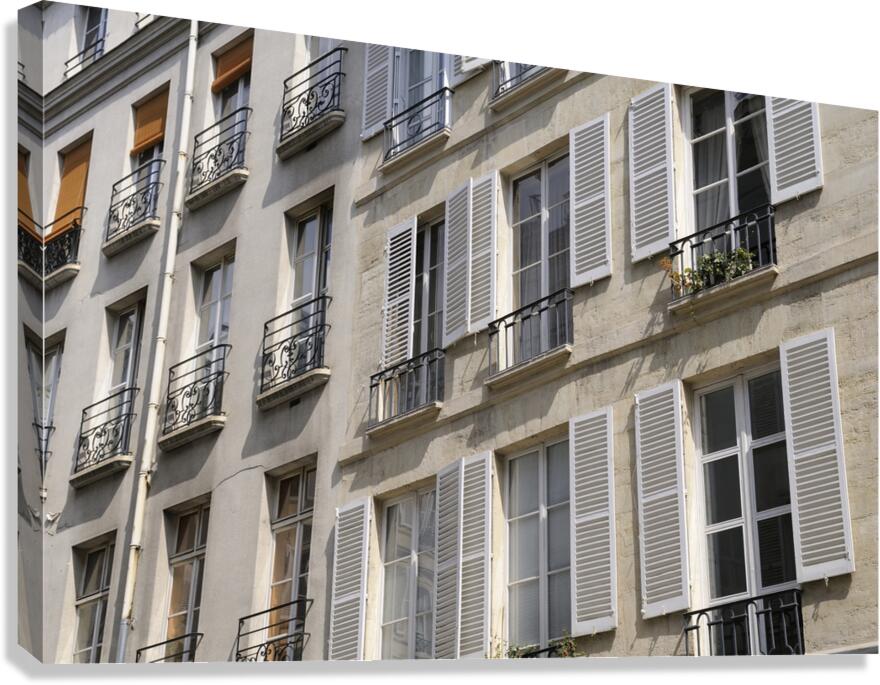 Apartment windows with open shutters and balconies - Paris Canvas Print