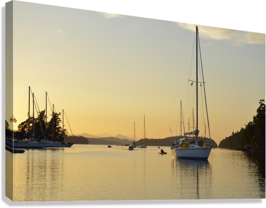 Sea kayaker and anchored boats in Princess Bay Canvas Print