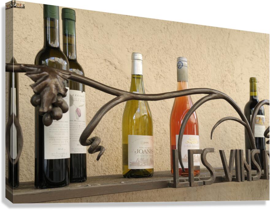 Les Vins Du Luberon store sign with bottled wine Lourmarin Vaucluse Provence Alpes Côte dAzur France Canvas Print