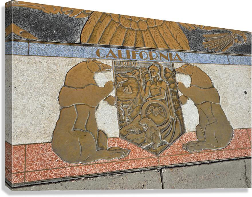 Bas relief plaque for California is inlaid into Hoover Dams plazas surface one of the seven states that fall within the Colorado Rivers basin. Hoover Dam Arizona Nevada USA Canvas Print