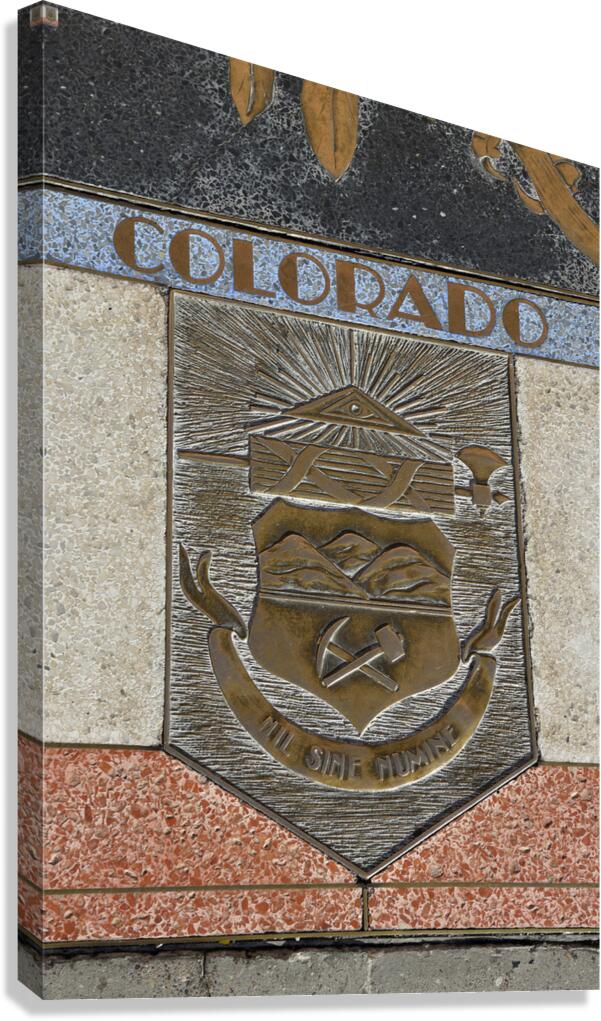 Bas relief plaque for Colorado is inlaid into Hoover Dams plazas surface one of the seven states that fall within the Colorado Rivers basin. Hoover Dam Arizona Nevada USA Canvas Print
