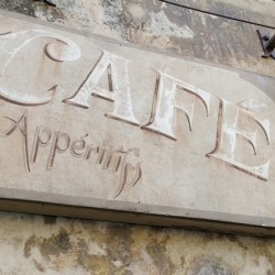 Cafe sign in Lourmarin