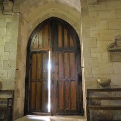 Shaft of light coming through the entrance door.  Eglise de Saint Maurice. Chatillon-sur-Loire Centre. France