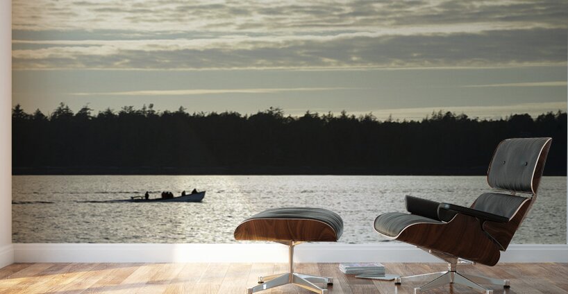 Backlit small boat coming into Tofino Wall Murals
