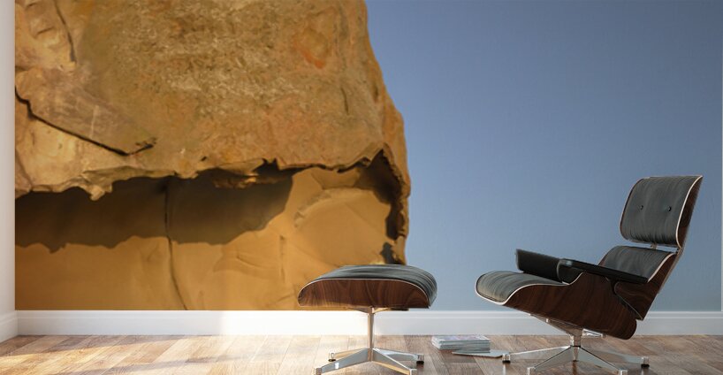 Sea kayaking under sculpted sandstone cliffs Wall Murals