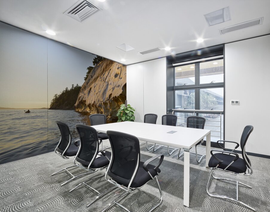 Sea kayaking under the sculpted sandstone cliffs Wall Printing