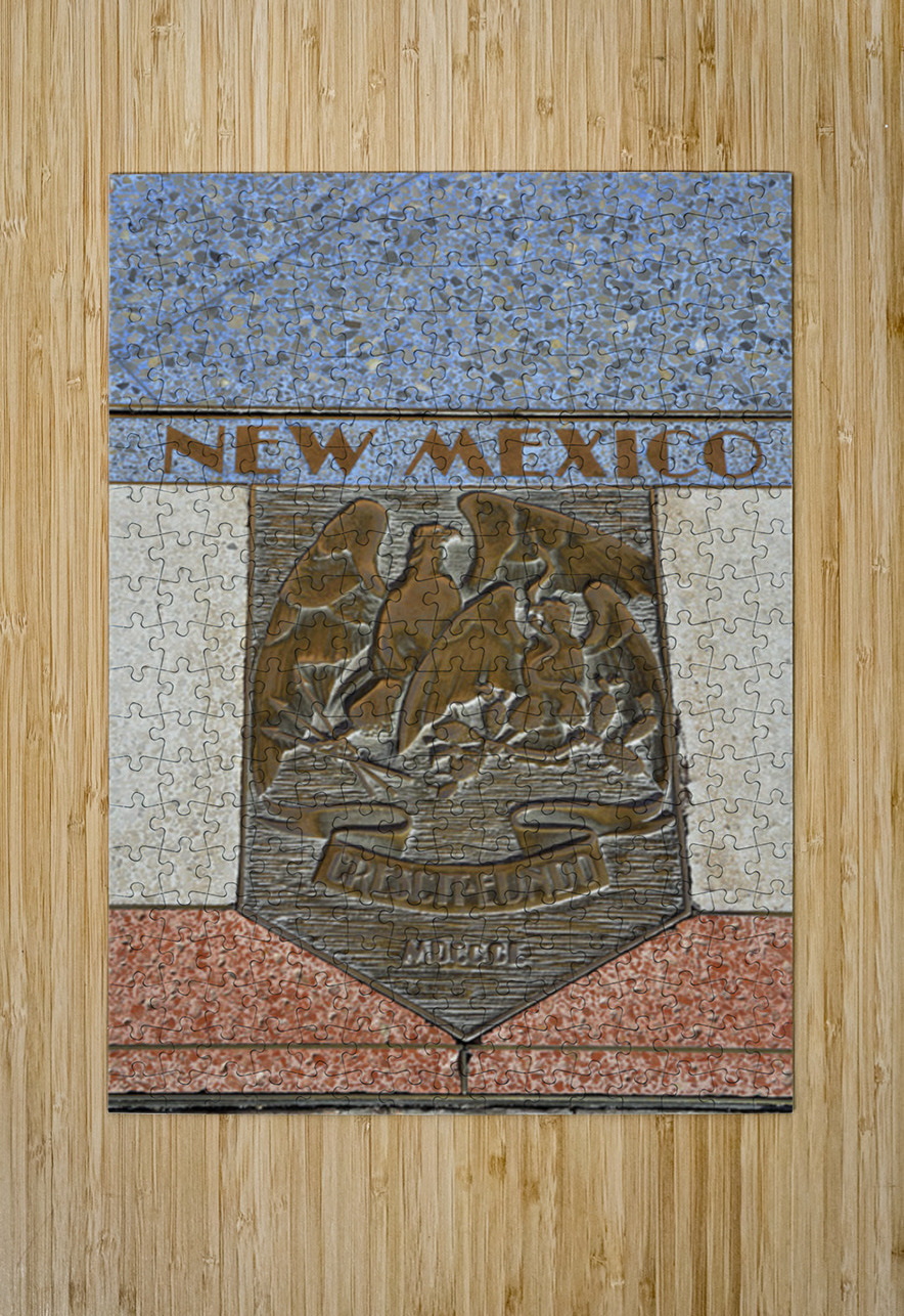 Bas relief plaque for New Mexico is inlaid into Hoover Dams plazas surface one of the seven states that fall within the Colorado Rivers basin. Hoover Dam Arizona Nevada USA Kevin Oke Puzzle printing