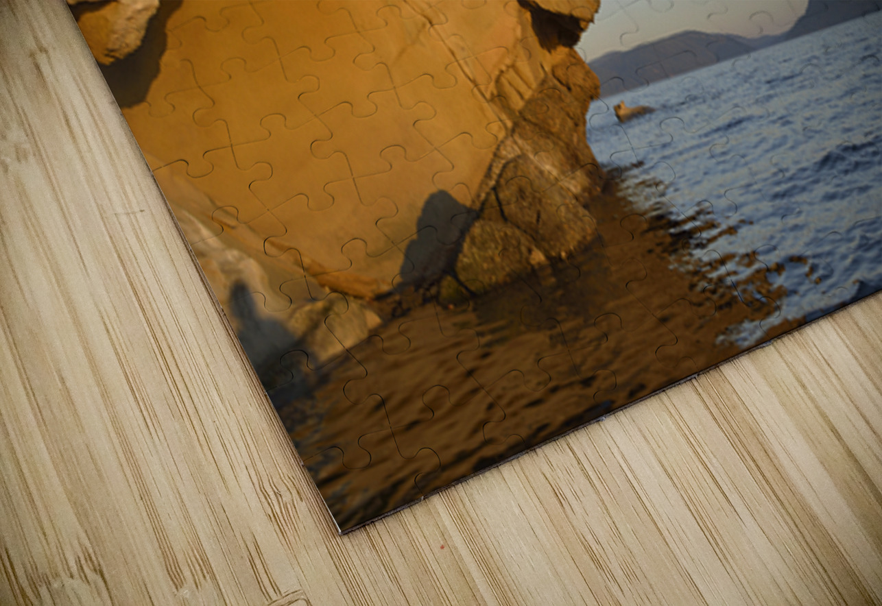 Sea kayaking under sculpted sandstone cliffs Kevin Oke Puzzle