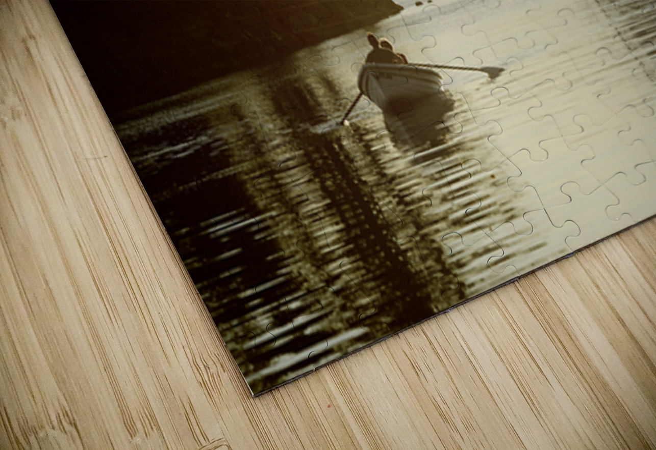 Couple in a dinghy rowing in front of a pleasure motorboat Kevin Oke Puzzle