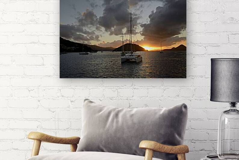 Caribbean sunset with catamarans and sailboats  by Kevin Oke