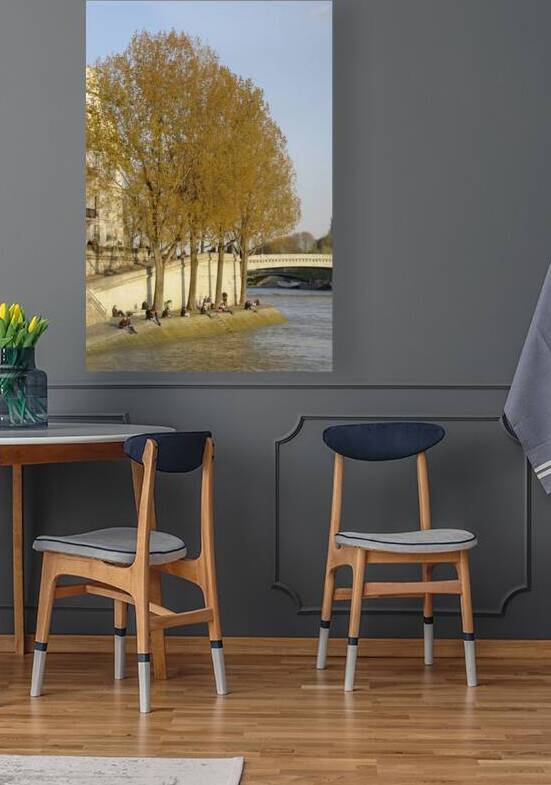 Enjoying a warm spring day on the banks of the Seine River - Paris by Kevin Oke