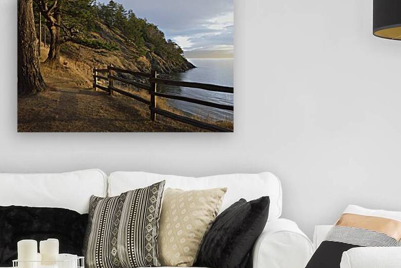 Wood fencing along the cliffs at East Cove by Kevin Oke