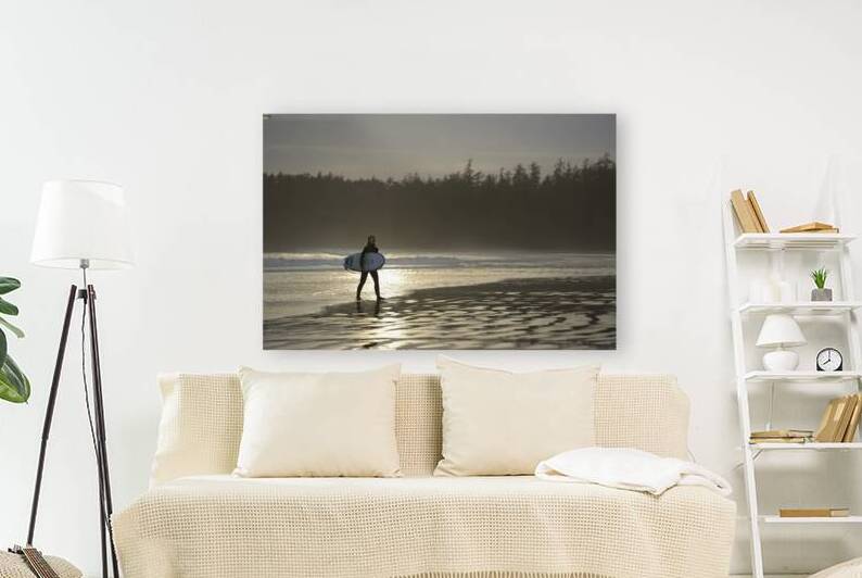 Women walking with a surfboard on Long Beach Pacific Rim National Park by Kevin Oke
