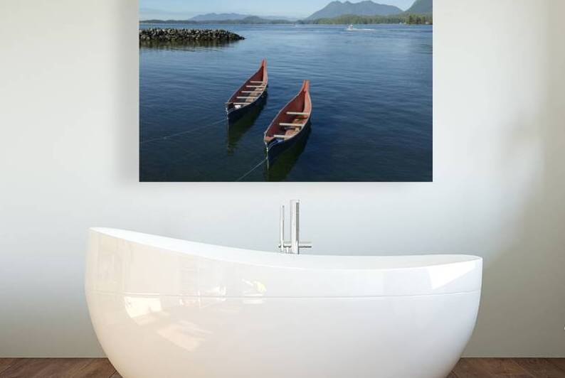 Two native canoes anchored in Tofino Harbour by Kevin Oke