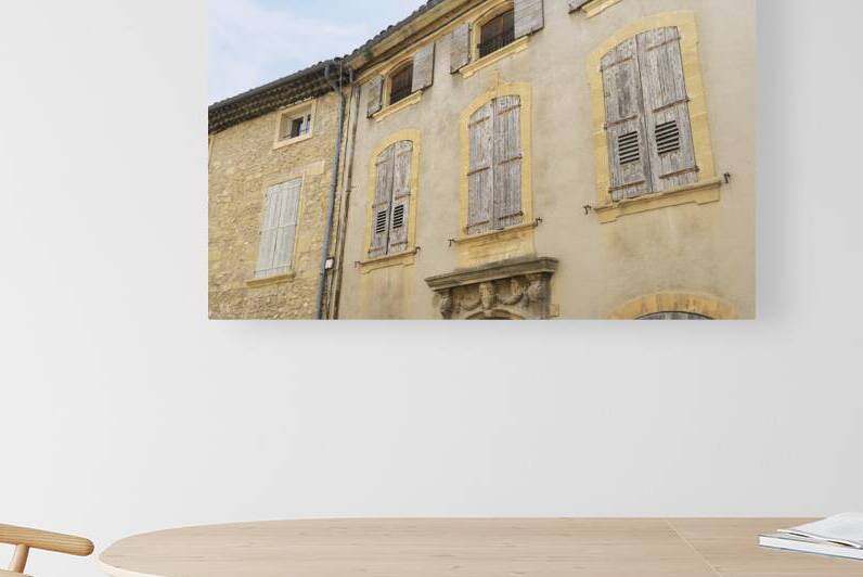 Shuttered windows on an old apartment  building Lourmarin Vaucluse Provence Alpes Côte dAzur France by Kevin Oke