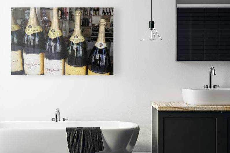 Champagne bottles in a liquor store Nevers Nièvre Burgundy France by Kevin Oke